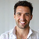 Portrait of a smiling man, John D.